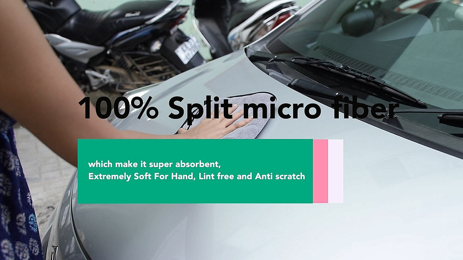 Girl's hand cleaning car with sobby car cleaning cloth. cloth is made of 100% split microfiber which make it super absorbent extremly soft for hands, Lint and anti scratch