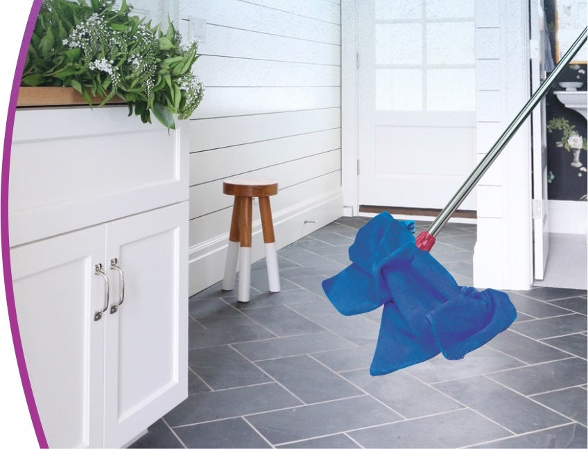 a wiper with microfiber cloth attach to it used for cleaning and disinfecting the foor of room a stool and a small almirah